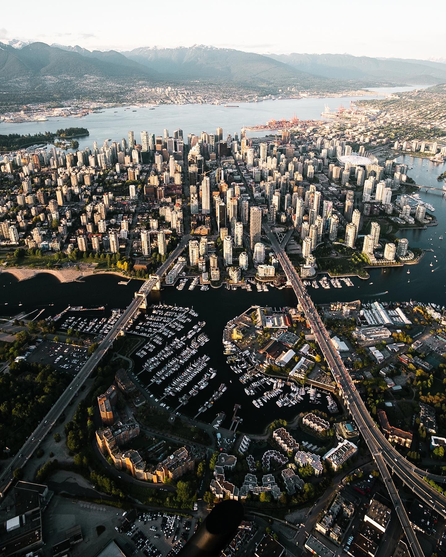 photo by Jeremy Lee caption reads: Burrard to Granville
.
.
This was an absolute insane shot to take :) happy weekend y’all! Any plans? I might hit up the Nordstrom 5% sale😭😭😭
‎
Edited in lightroom
.
.
-------
#vancouver #vancity #dailyhivevan #explorecanada #imagesofcanada #vancityfeature #heartsofcanada #droneglobe #curiocityvan #jwkleerunsaround #city_features #dronepals #explorebc #sharecangeo #canadavisuals #ig_color #architecturelovers #skyscraping_architecture #symmetryhunters #citykillerz
-------