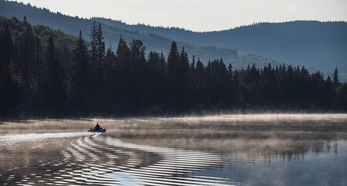 Heading out fishing on a misty morning on Lac des Roches in the Cariboo Chilcotin Coast